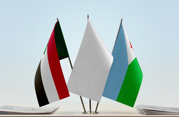 Flags of Sudan and Djibouti with a white flag in the middle