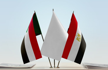 Flags of Sudan and Egypt with a white flag in the middle