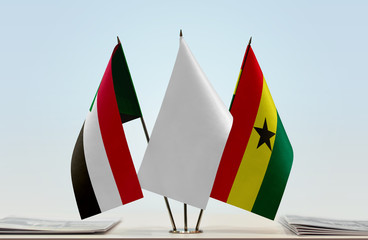 Flags of Sudan and Ghana with a white flag in the middle
