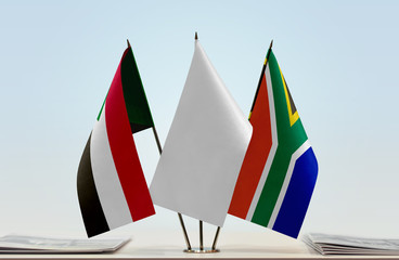 Flags of Sudan and Republic of South Africa with a white flag in the middle