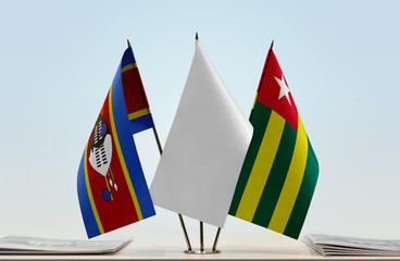 Flags of Swaziland and Togo with a white flag in the middle