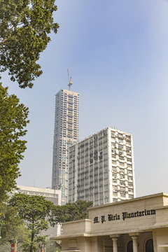 skyscraper and Birla Planetarium, Kolkata, West Bengal, India