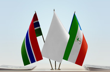 Flags of The Gambia and Equatorial Guinea with a white flag in the middle
