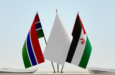 Flags of The Gambia and Sahrawi Arab Democratic Republic with a white flag in the middle