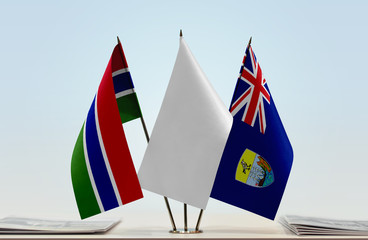 Flags of The Gambia and Saint Helena with a white flag in the middle
