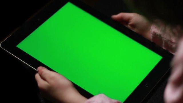 Child with Tablet Device, Green Screen