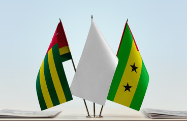 Flags of Togo and Sao Tome and Principe with a white flag in the middle