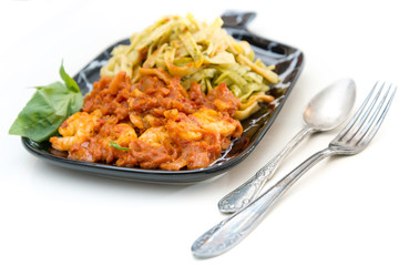 spaghetti with pesto sauce and Shrimp on a the table