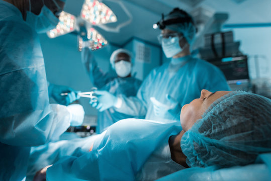 Patient Lying On Operating Table During Surgery