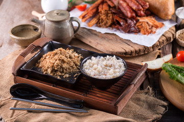 Dried shredded pork and mush, Chinese breakfast on Wooden Tray
