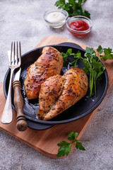 Grilled chicken breast or fillet on iron pan