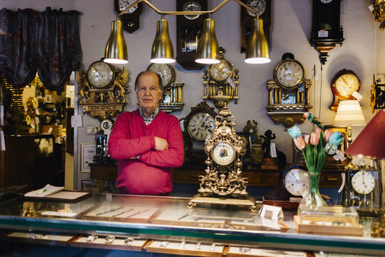 Sales clerk in antique store in Sweden