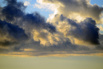 Clouds illuminated by the Sun in backlight.