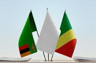 Flags of Zambia and Republic of the Congo with a white flag in the middle