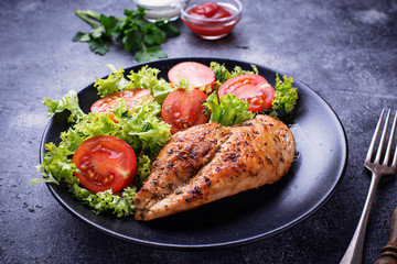 Grilled chicken breast with vegetable salad