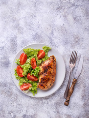 Grilled chicken breast with vegetable salad