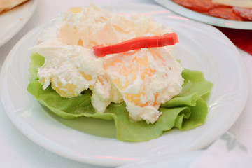 A plate of potato salad 