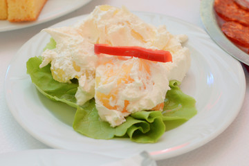 A plate of potato salad 