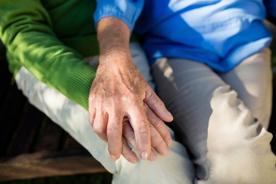 Focus on senior couples hands