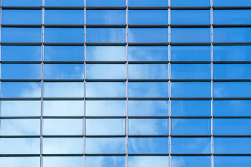 Glass walls of urban skyscrapers