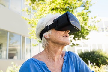 Senior woman looking in 3D glasses