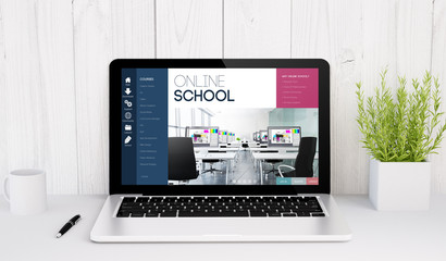 laptop on table online school