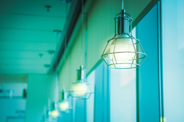 Fototapeta na wymiar Modern style light bulb lamp in office.