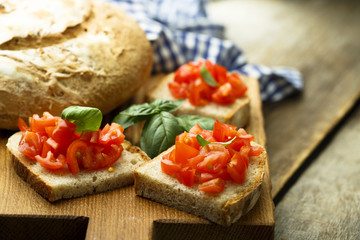 Basil and tomato bruschetta on homemade rye bread