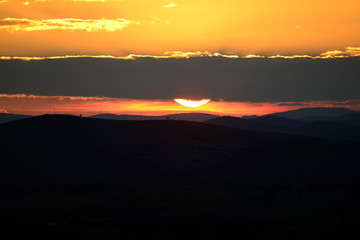 Fototapeta premium Clouds illuminated by the Sun in backlight.