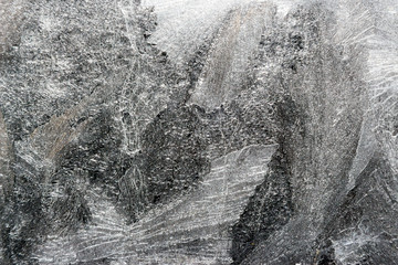 a window covered in frozen water