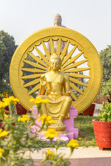 sculpture of Buddha next to Wat Thai Sarnath Temple in Sarnath, Varanasi, Uttar Pradesh, India