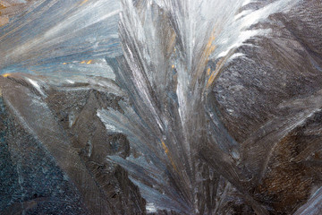 a window covered in frozen water