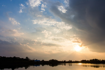 colorful dramatic sky with cloud at sunset.