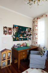 decorative wood details study room concept with scissors and green board decoration.