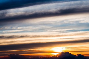 Obraz premium colorful dramatic sky with cloud at sunset.