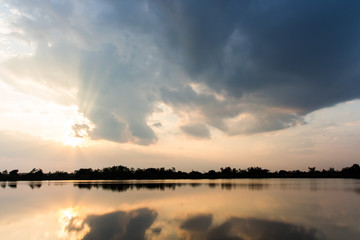 colorful dramatic sky with cloud at sunset.