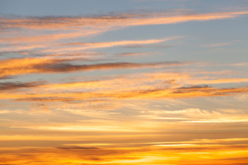 colorful dramatic sky with cloud at sunset.