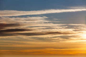 colorful dramatic sky with cloud at sunset.