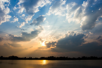 colorful dramatic sky with cloud at sunset.