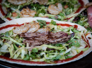 Plate with fresh healthy vegetables, meat and fish