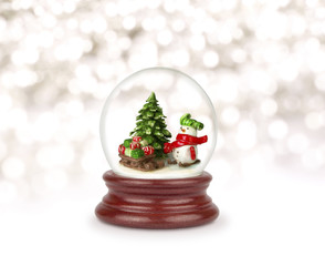 Christmas snow globe. Can be used as a Christmas or a New Year gift or symbol. Snowman with gifts.