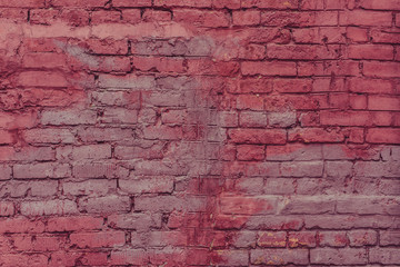 Old brick masonry painted in red - retro background