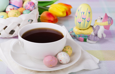 Cup of coffee and Easter candy treats