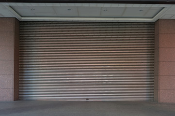 sidewalk by street wall & door