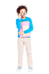 Fototapeta premium Portrait of cute curly-haired Latin American elementary student wearing eyeglasses