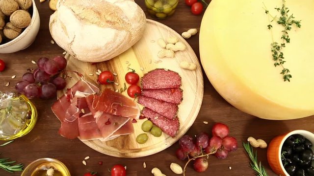 Table top panarama - cheese, meat, jamon, grape, bread, snaks