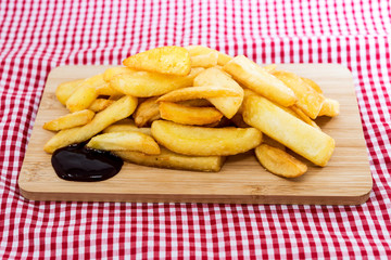 Golden French fries potatoes ready to be eaten