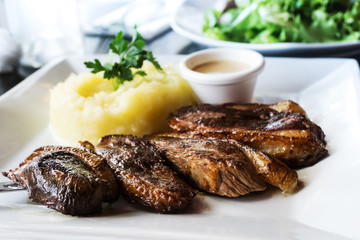 juicy steak veal beef meat with  vegetables