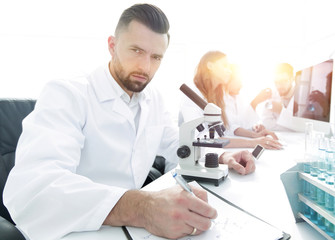 serious scientists working in the laboratory