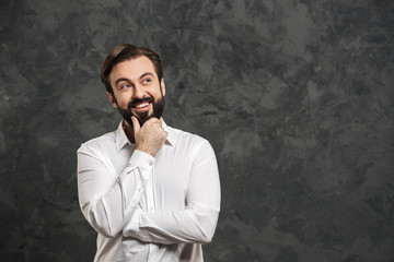 Portrait of a smiling young man dressed white shirt